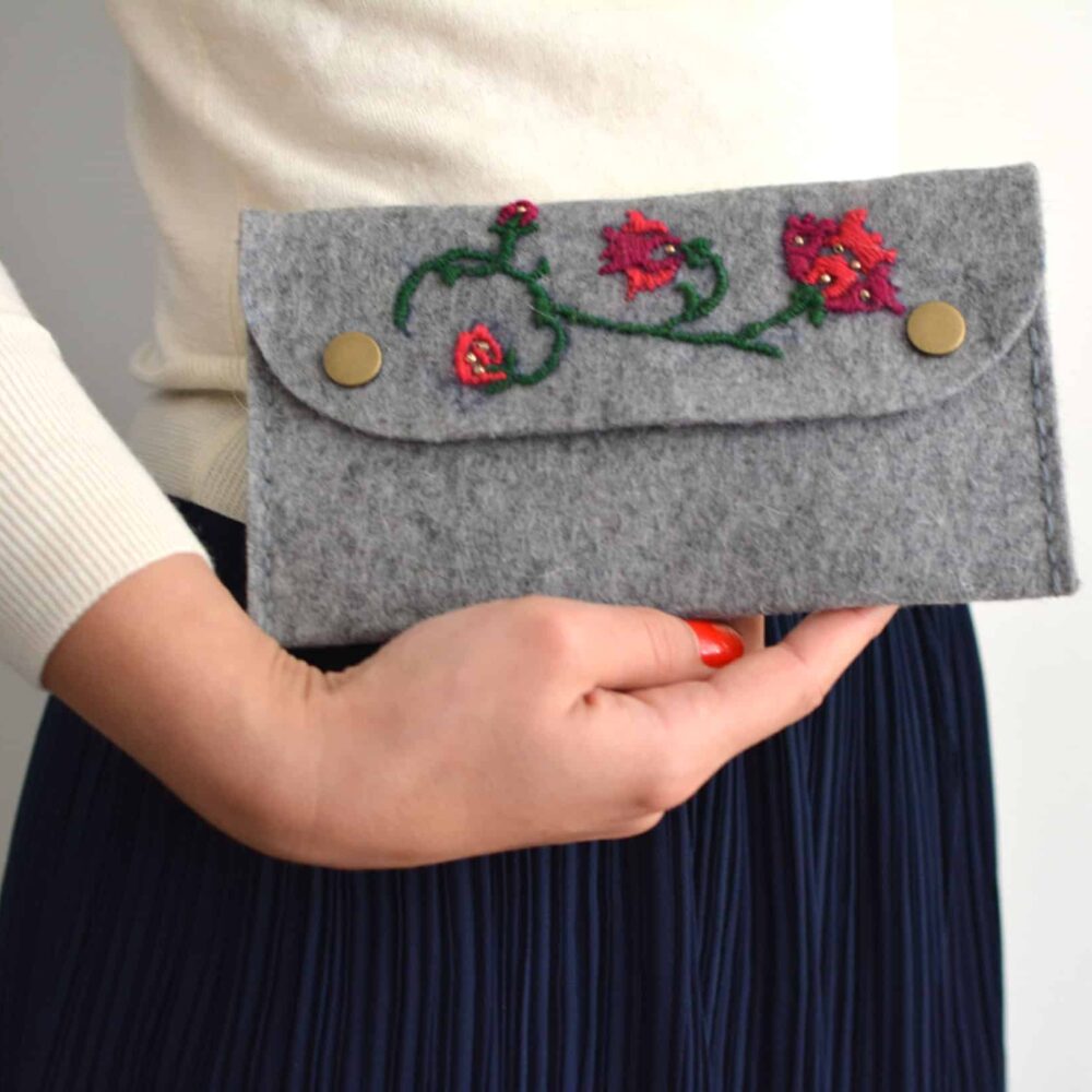 hand-embroidered felt clutch bag