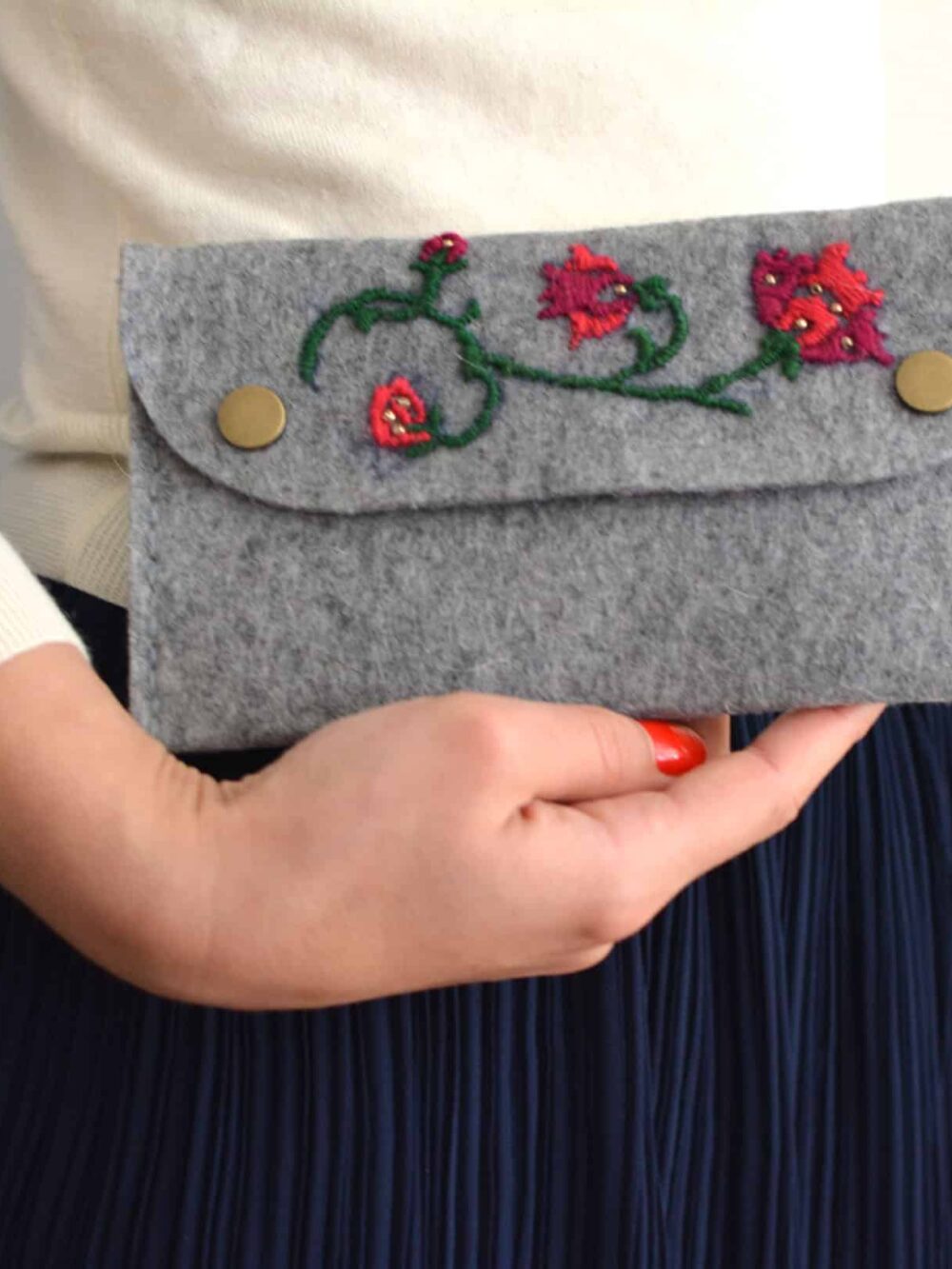 hand-embroidered felt clutch bag