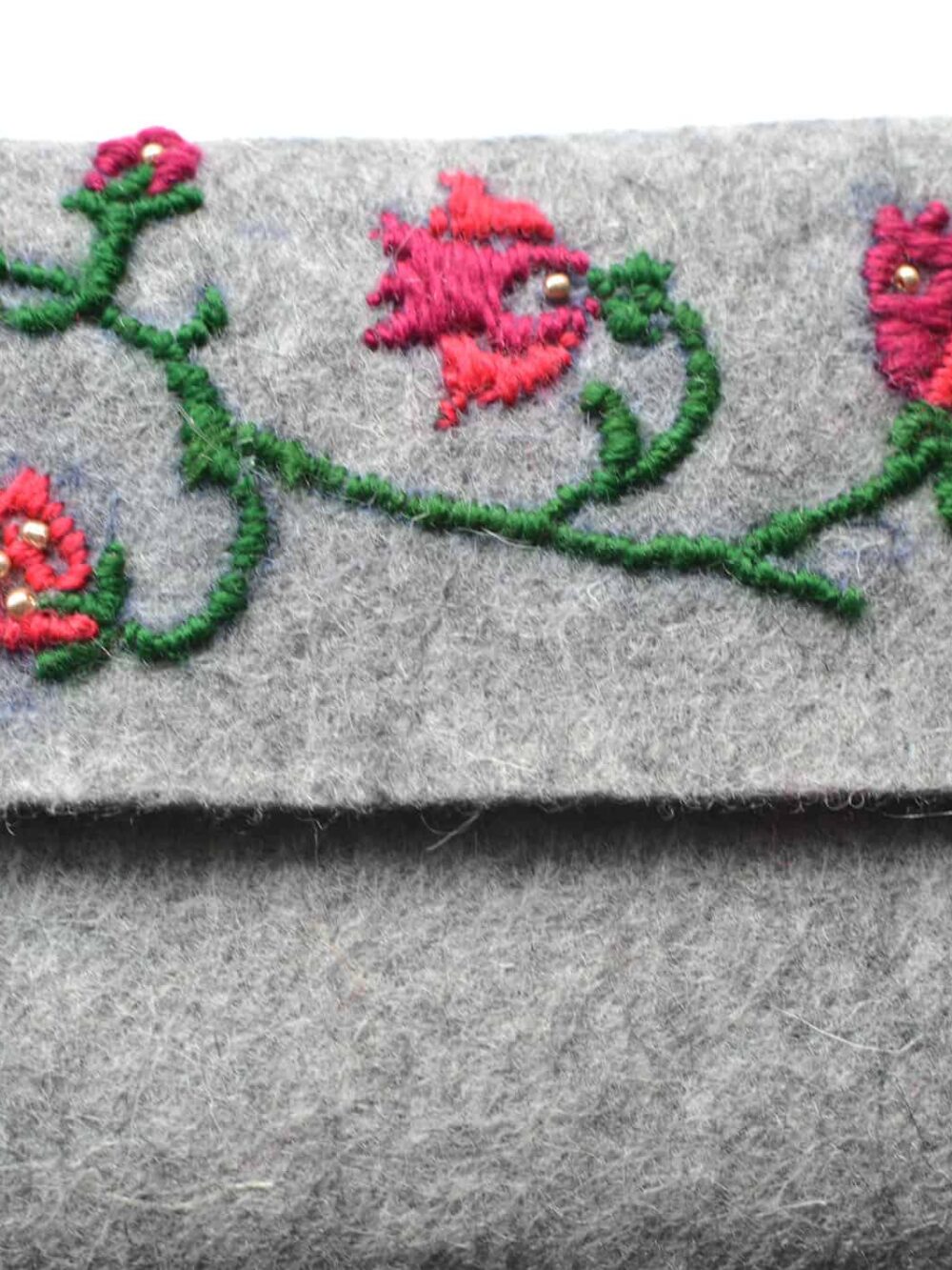 hand-embroidered felt clutch bag