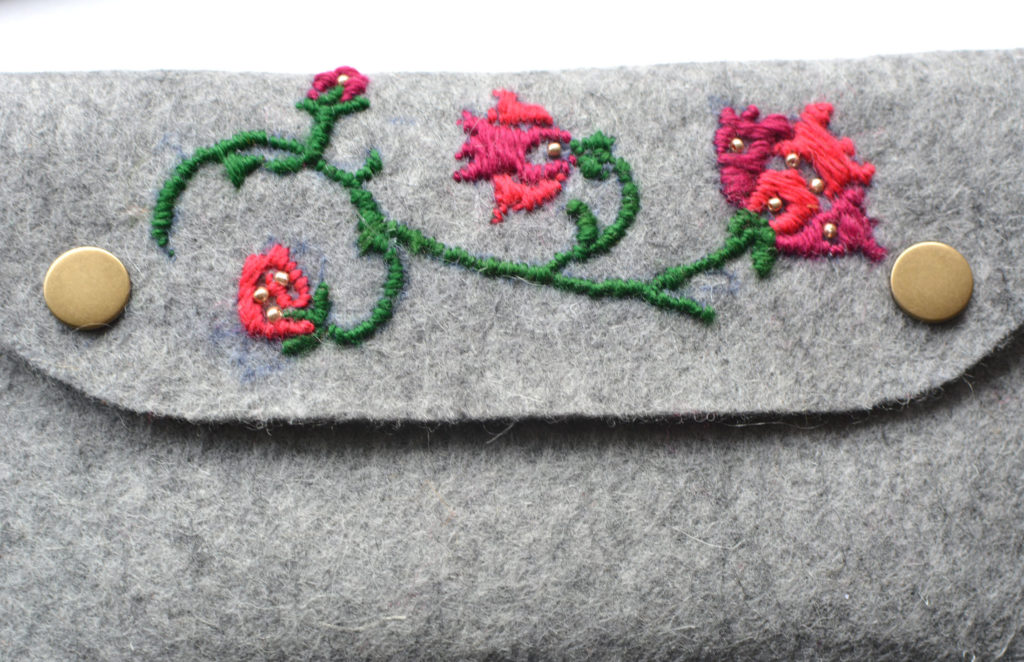hand-embroidered felt clutch bag