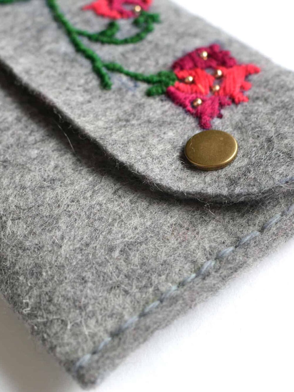 hand-embroidered felt clutch bag