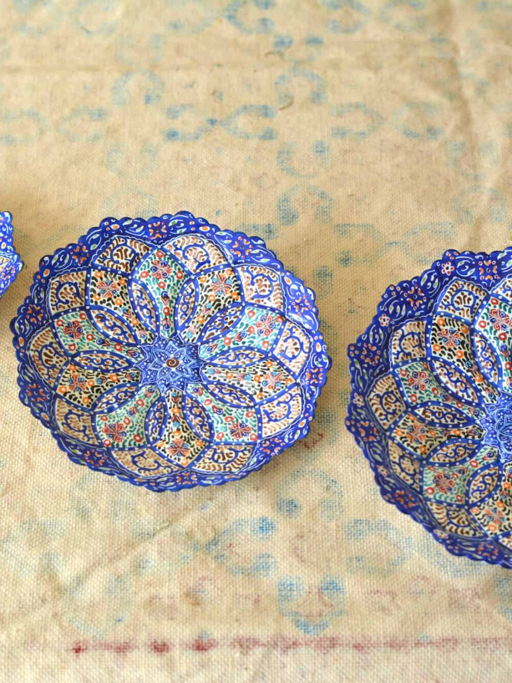 Set of 3 hand-painted enamelled plates