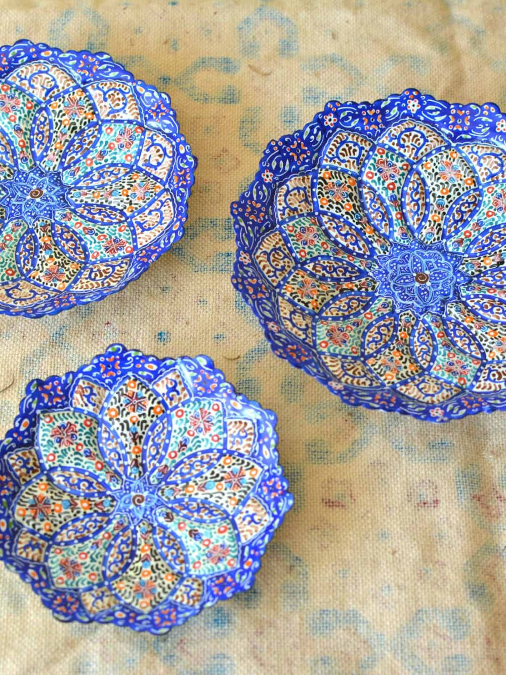 Set of 3 hand-painted enamelled plates