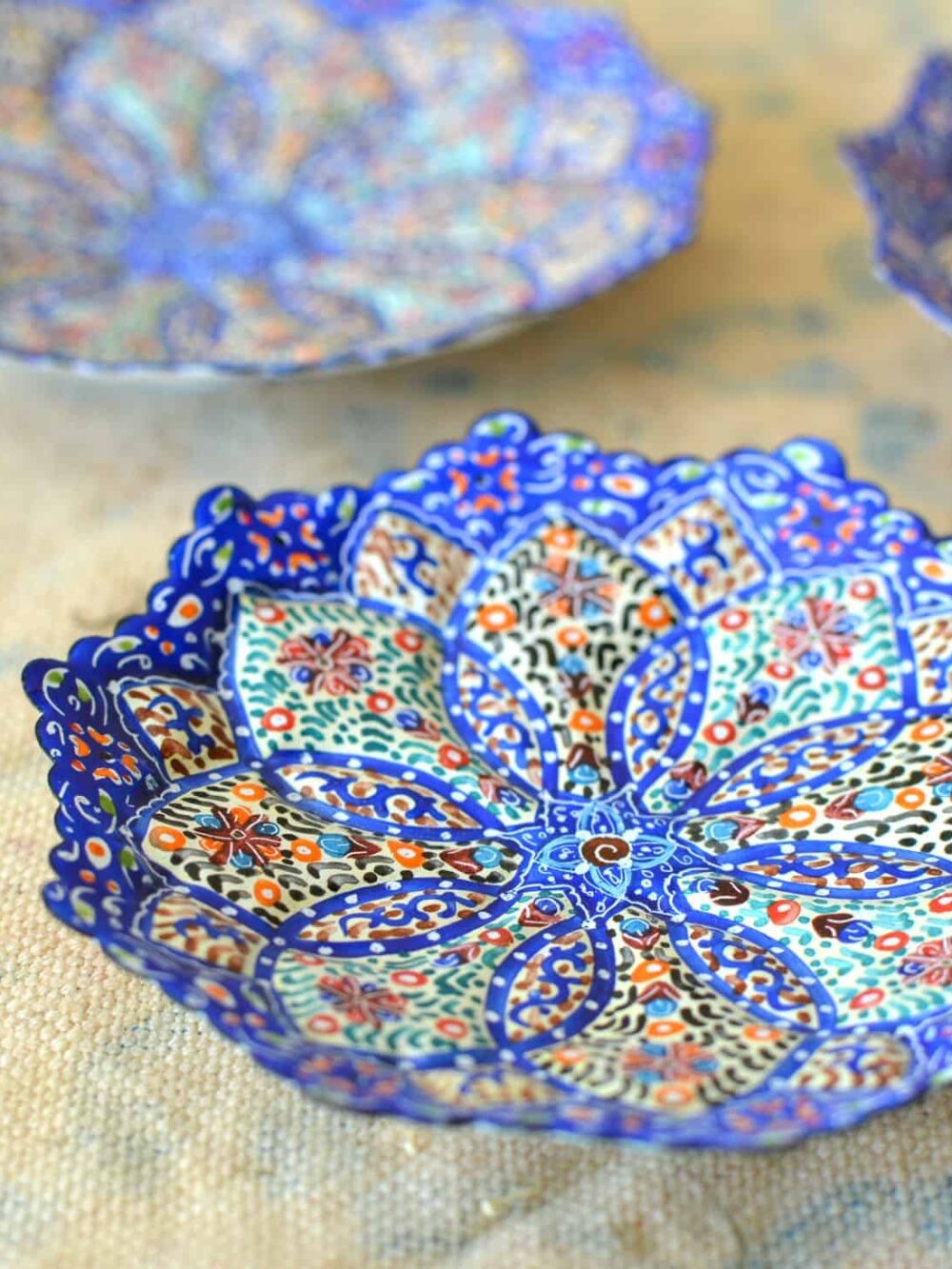 Set of 3 hand-painted enamelled plates