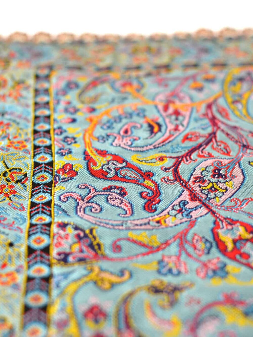turquoise tablecloth with golden trim