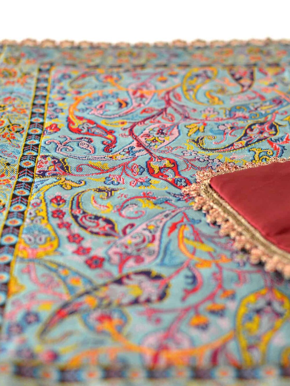 turquoise tablecloth with golden trim