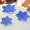 Enhance your home with this set of three Persian copper enamel  (Minakari) star dishes, hand-painted with intricate floral designs in vibrant blue,