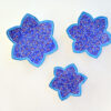 Enhance your home with this set of three Persian copper enamel  (Minakari) star dishes, hand-painted with intricate floral designs in vibrant blue,