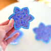 Enhance your home with this set of three Persian copper enamel  (Minakari) star dishes, hand-painted with intricate floral designs in vibrant blue,